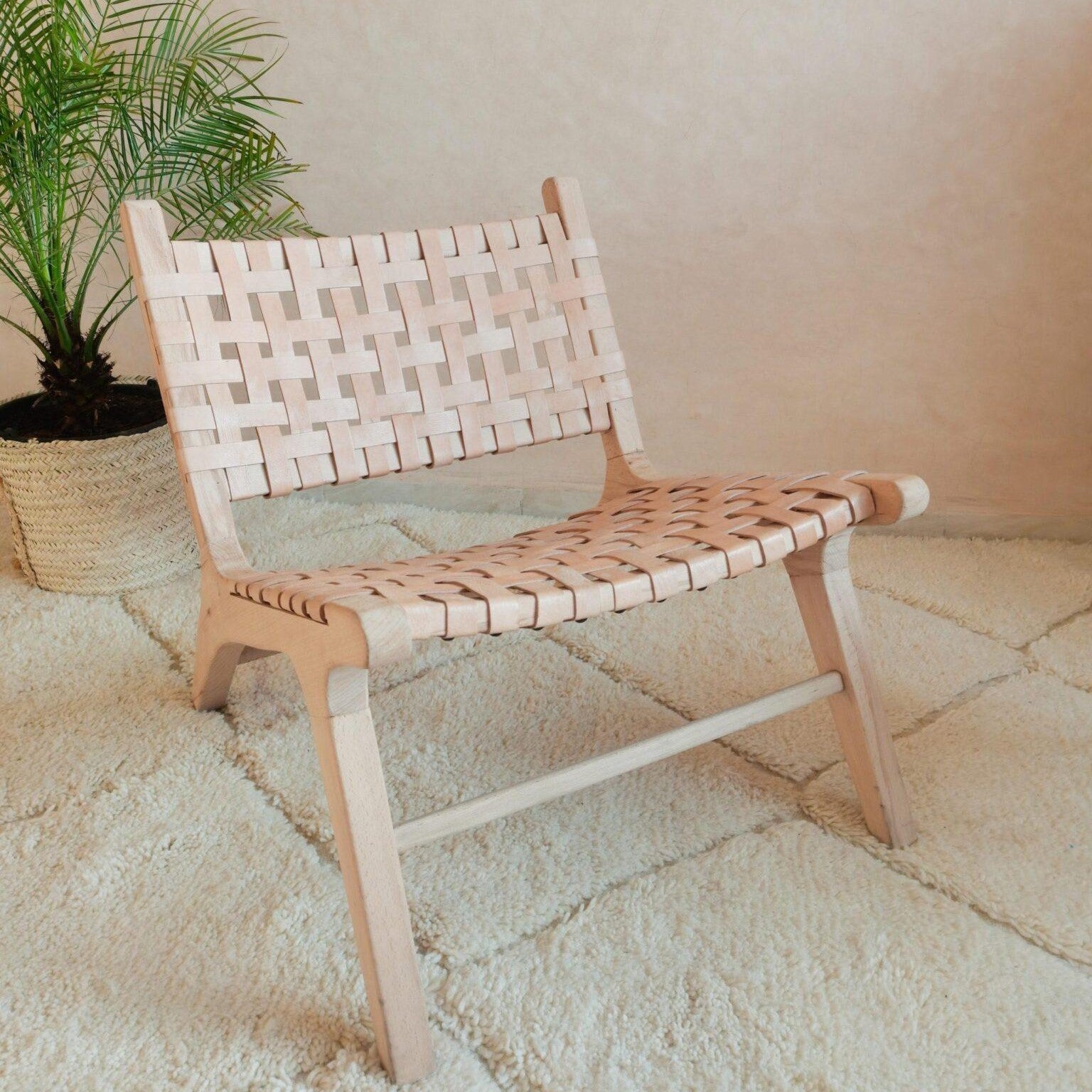 Solid oak wood armchair with leather straps